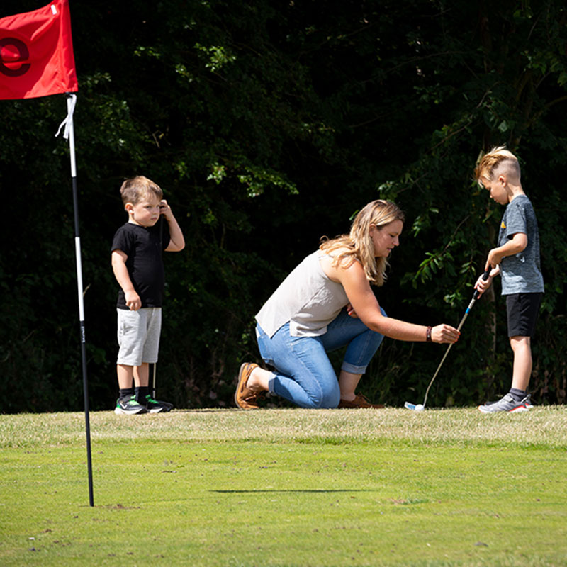 Tilly teaching golf